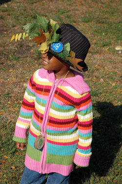 Girl with CKP pin on hat